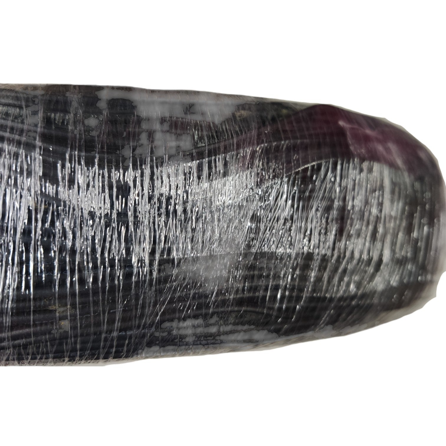 Close-up of a textured black and white object on a white background