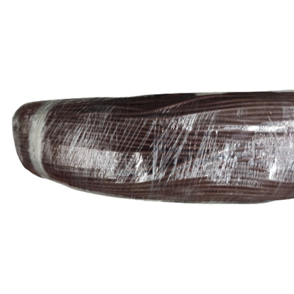 Close-up of a textured brown object on a white background