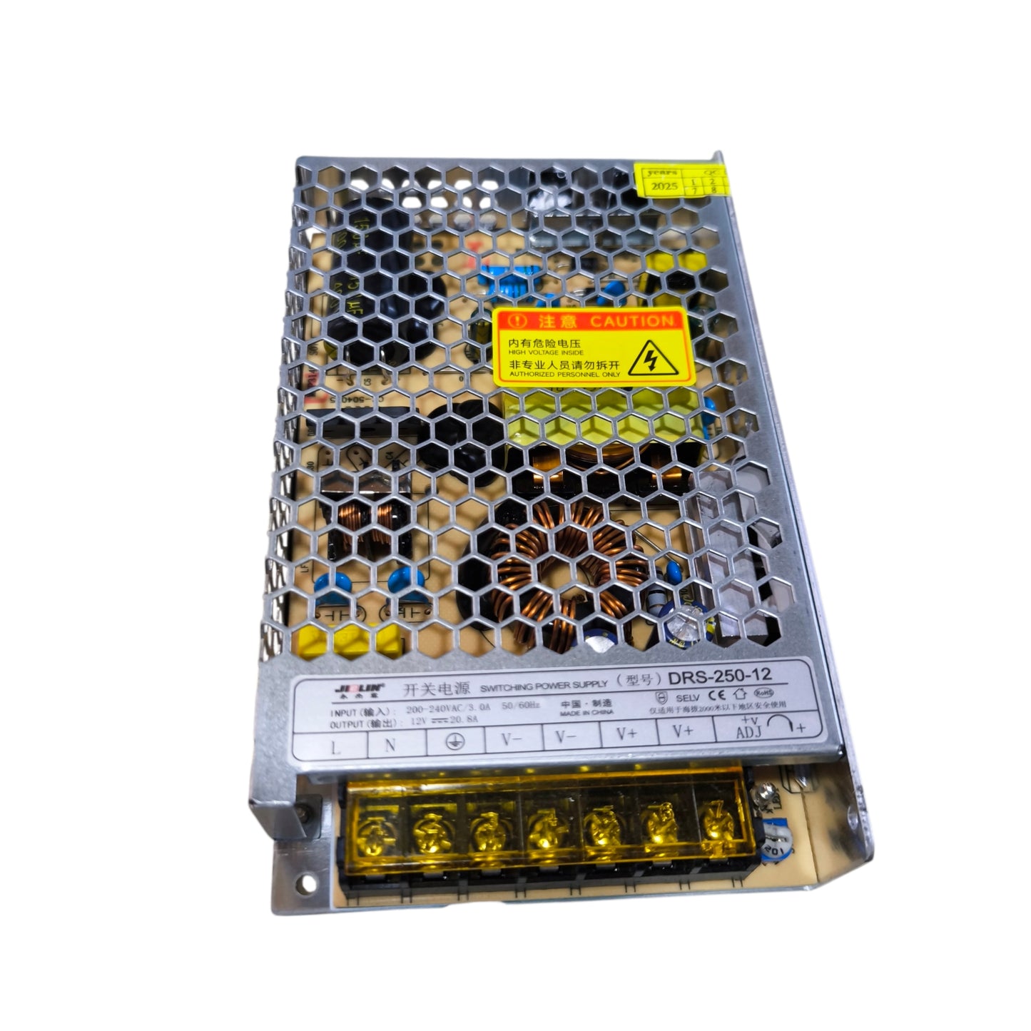 Metallic power supply unit with honeycomb design on a white background