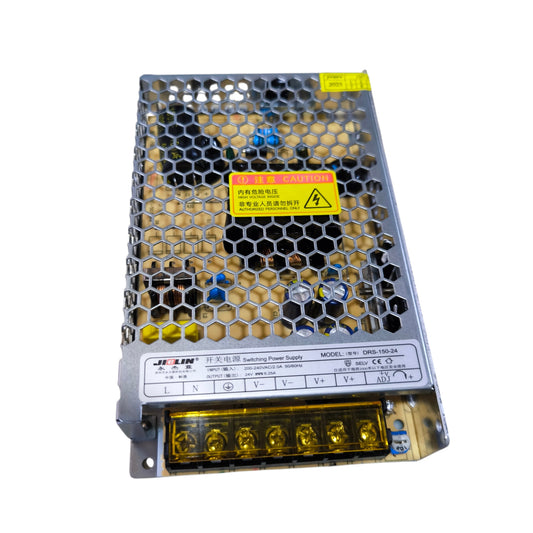 Switching power supply with warning label on a white background