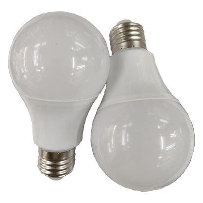 Two white light bulbs on a white background