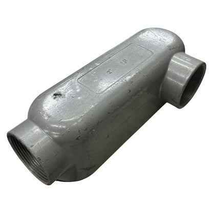 Gray metal pipe fitting on a white background