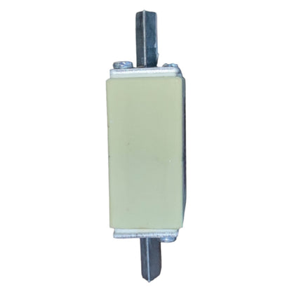 Rectangular ceramic component with metal pins on a white background