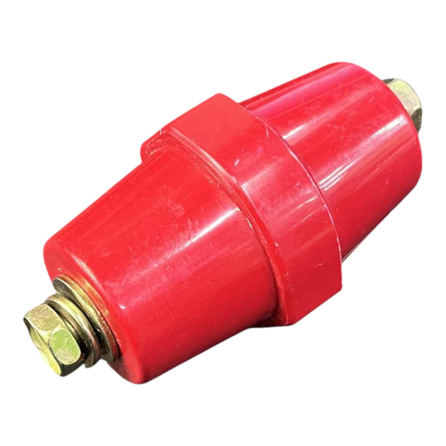 Red mechanical component with brass fittings on a white background