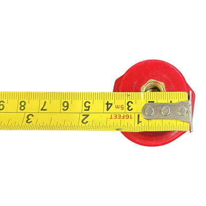 Yellow measuring tape with red casing on a white background
