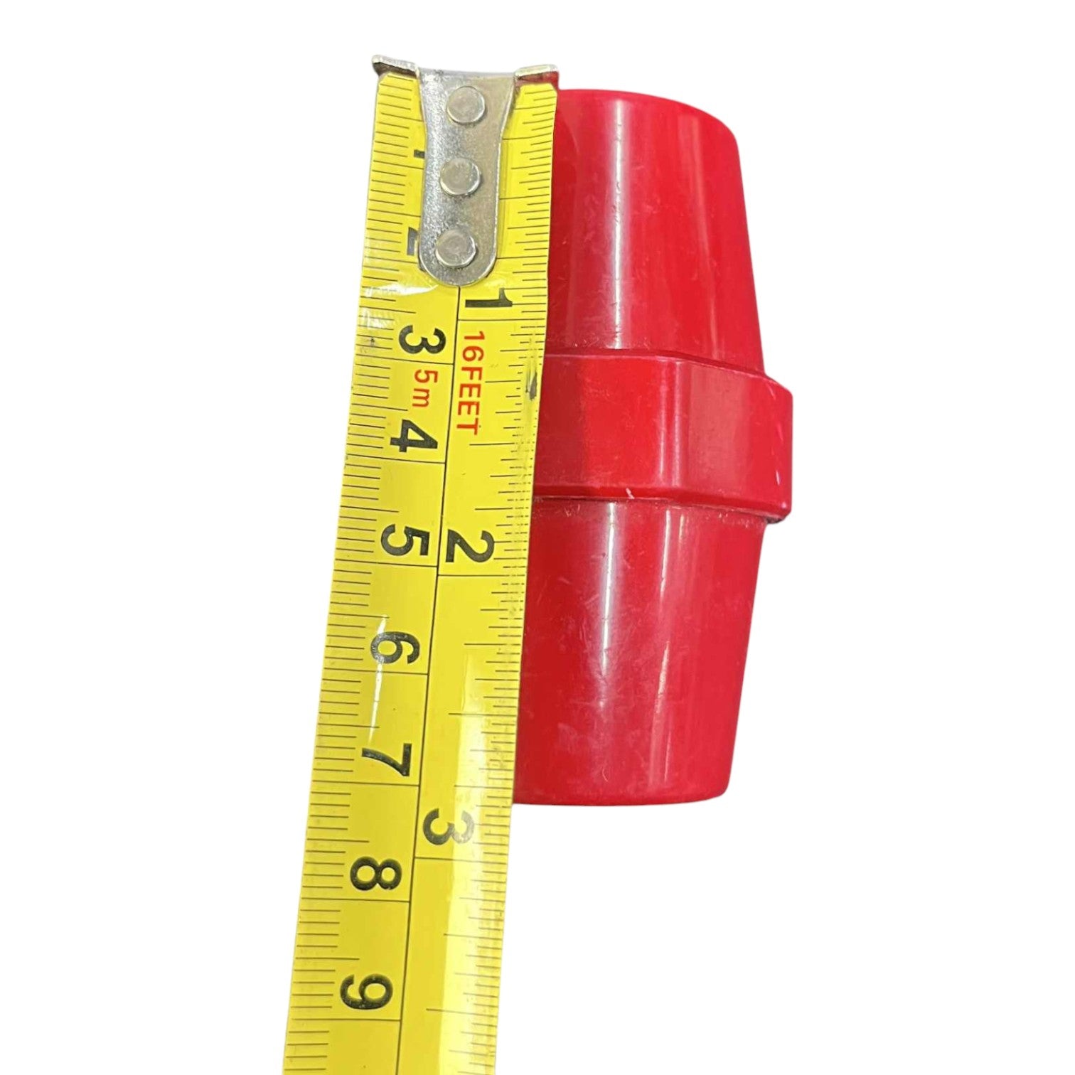 Red plastic pipe fitting with a yellow measuring tape showing its dimensions on a white background