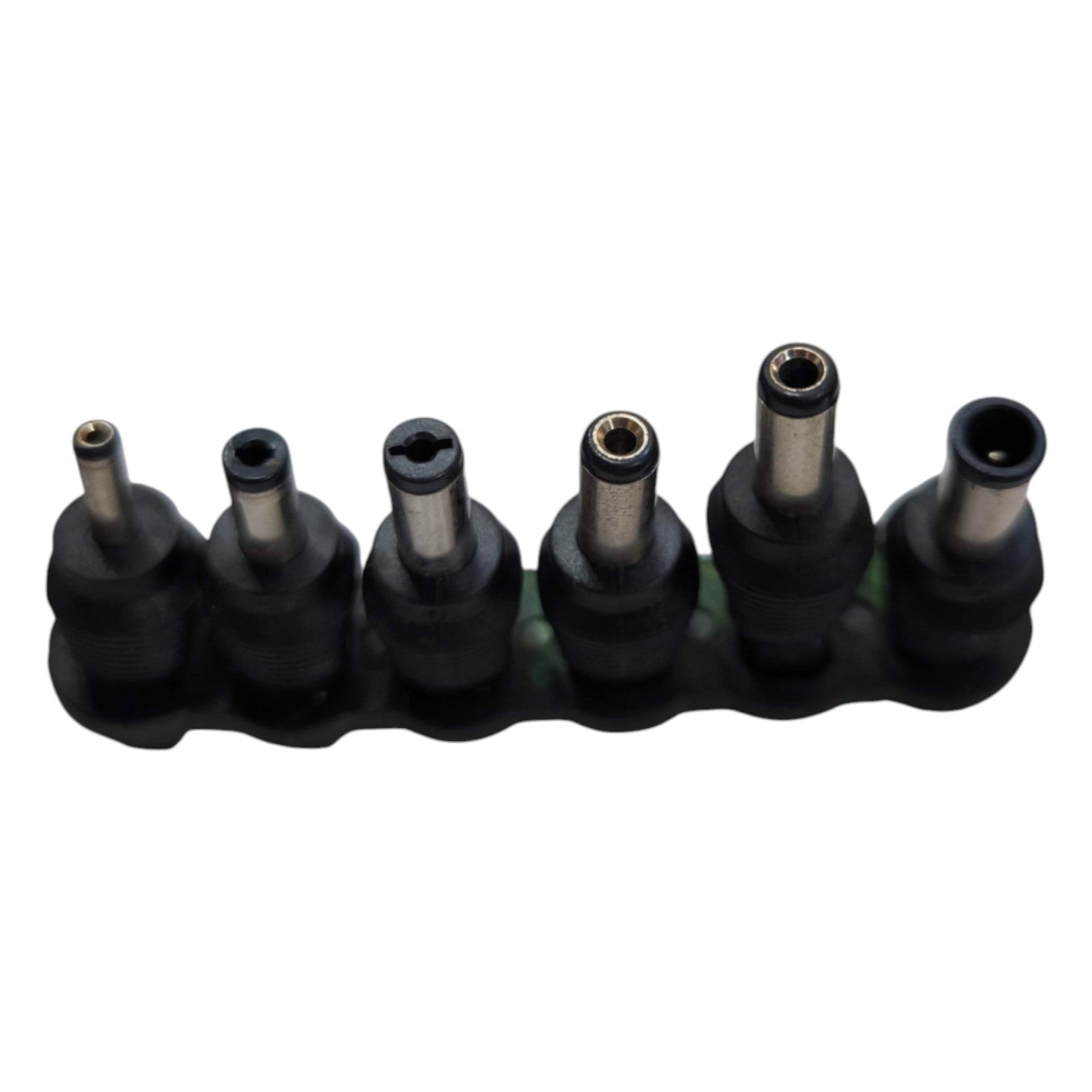 Set of black electrical connectors on a white background