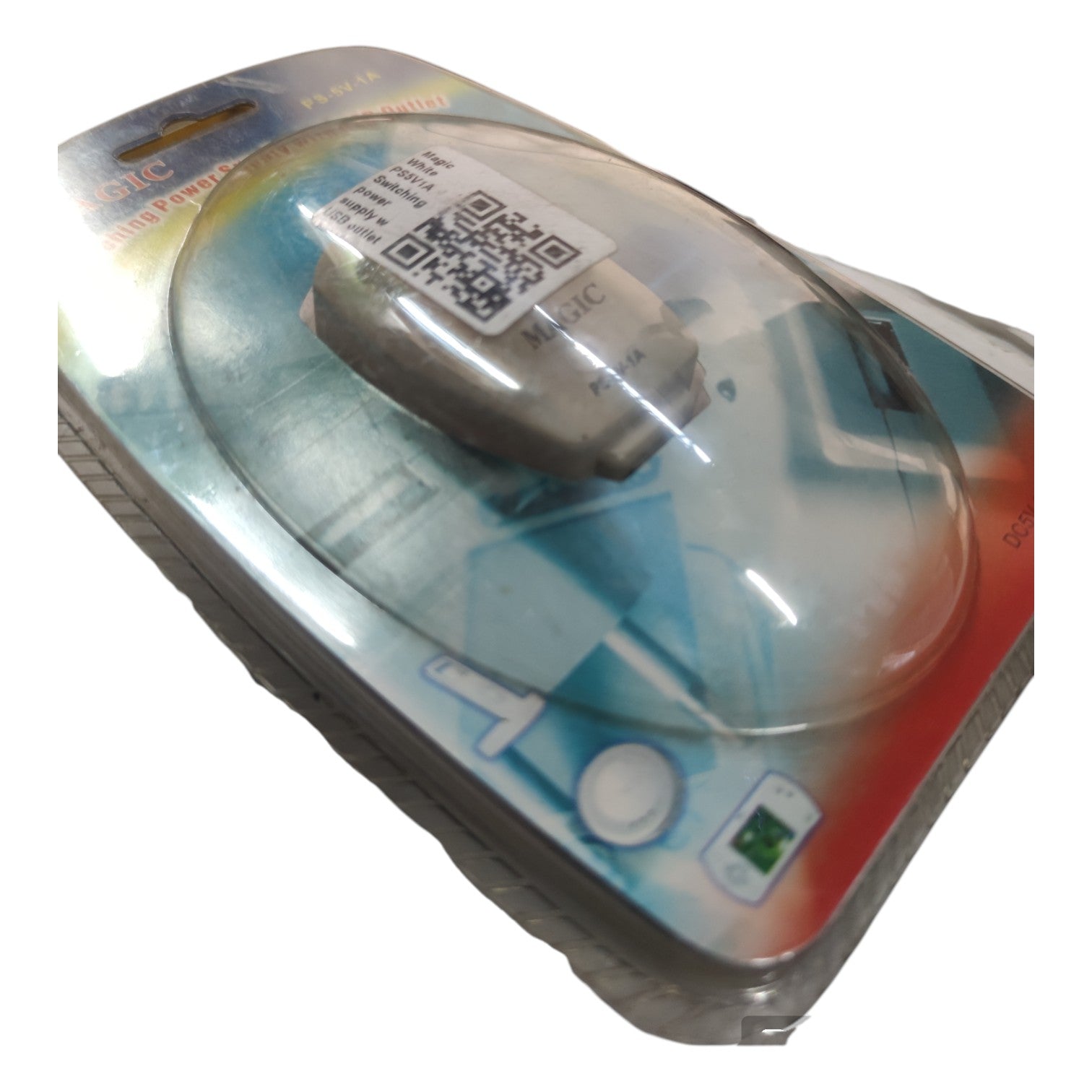 Electronic device with a QR code on a clear plastic cover, surrounded by colorful packaging.