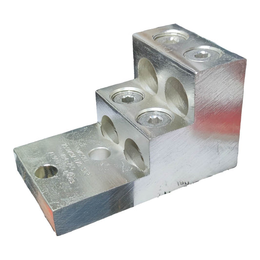 Metal block with multiple holes on a white background