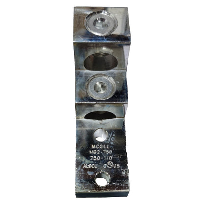 Metallic component with threaded holes on a white background