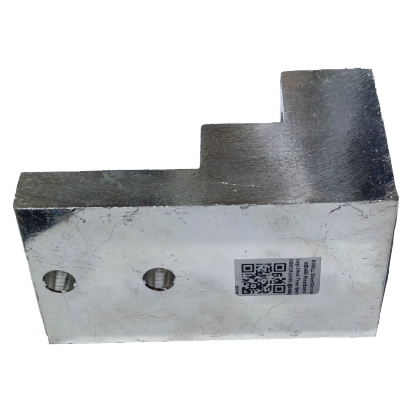 Metal block with a QR code label on a white background