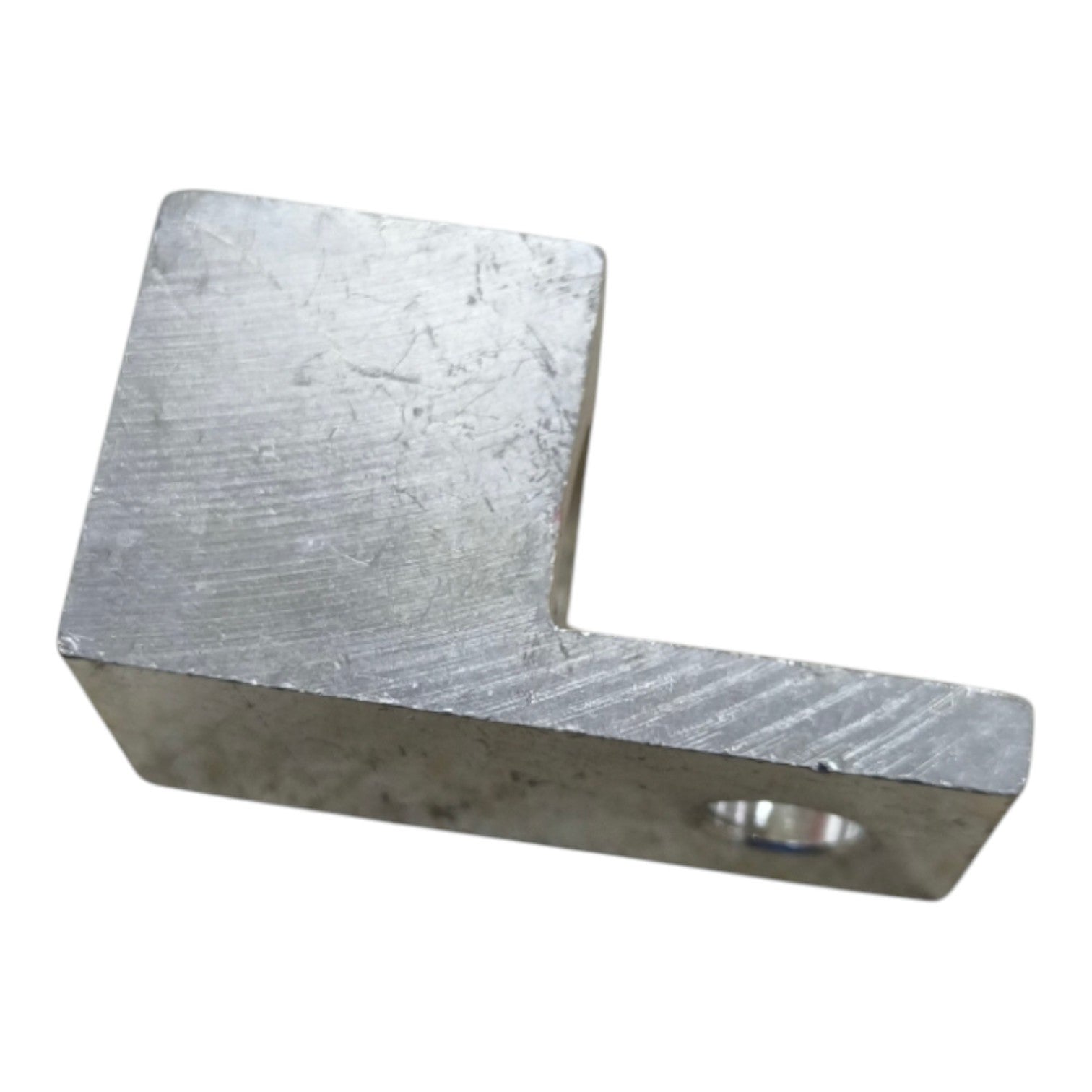 Metal L-shaped block on a white background