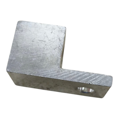 Metal L-shaped block on a white background