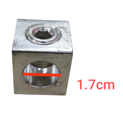 Metal block with two cylindrical holes and a measurement label on a white background