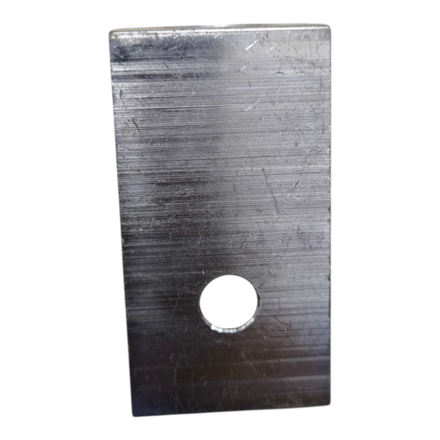 Rectangular metal plate with a central hole on a white background