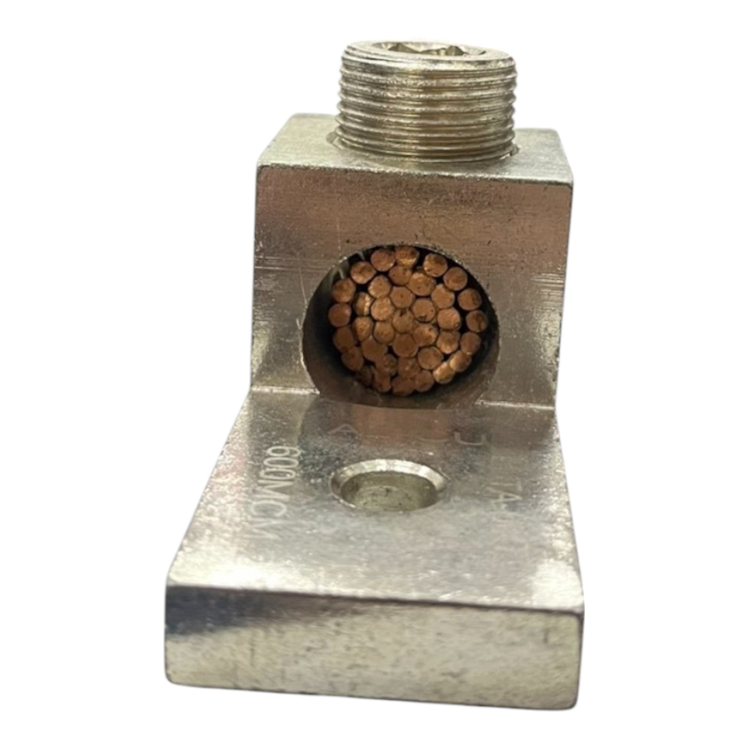 Metal fitting with threaded end and cylindrical component on a white background