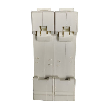 Beige plastic component on a white background