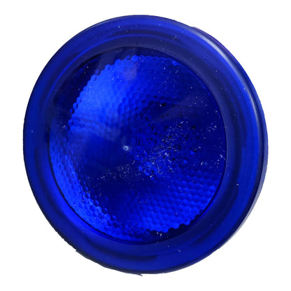 Blue glass bottle cap on a white background