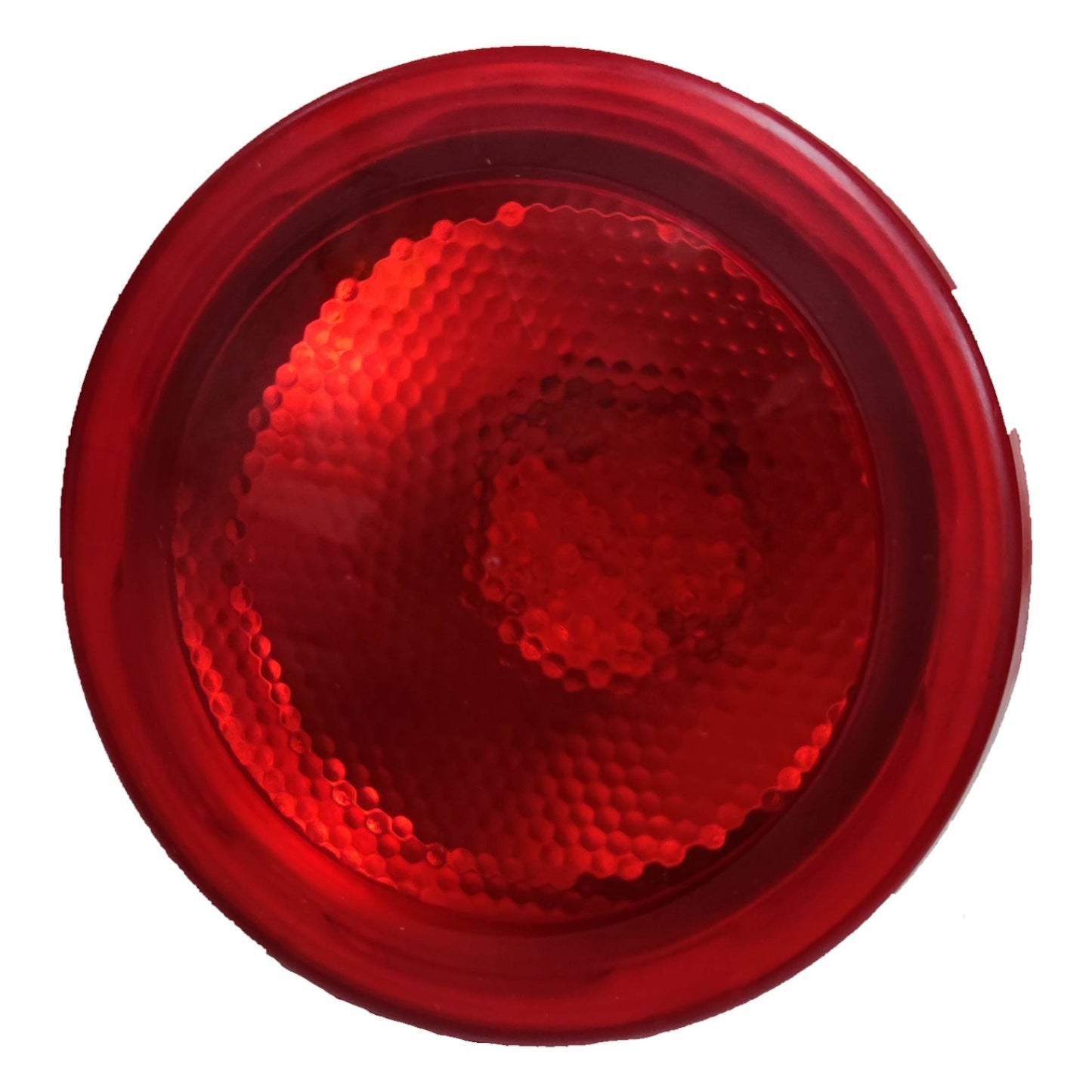 Red circular reflector on a white background