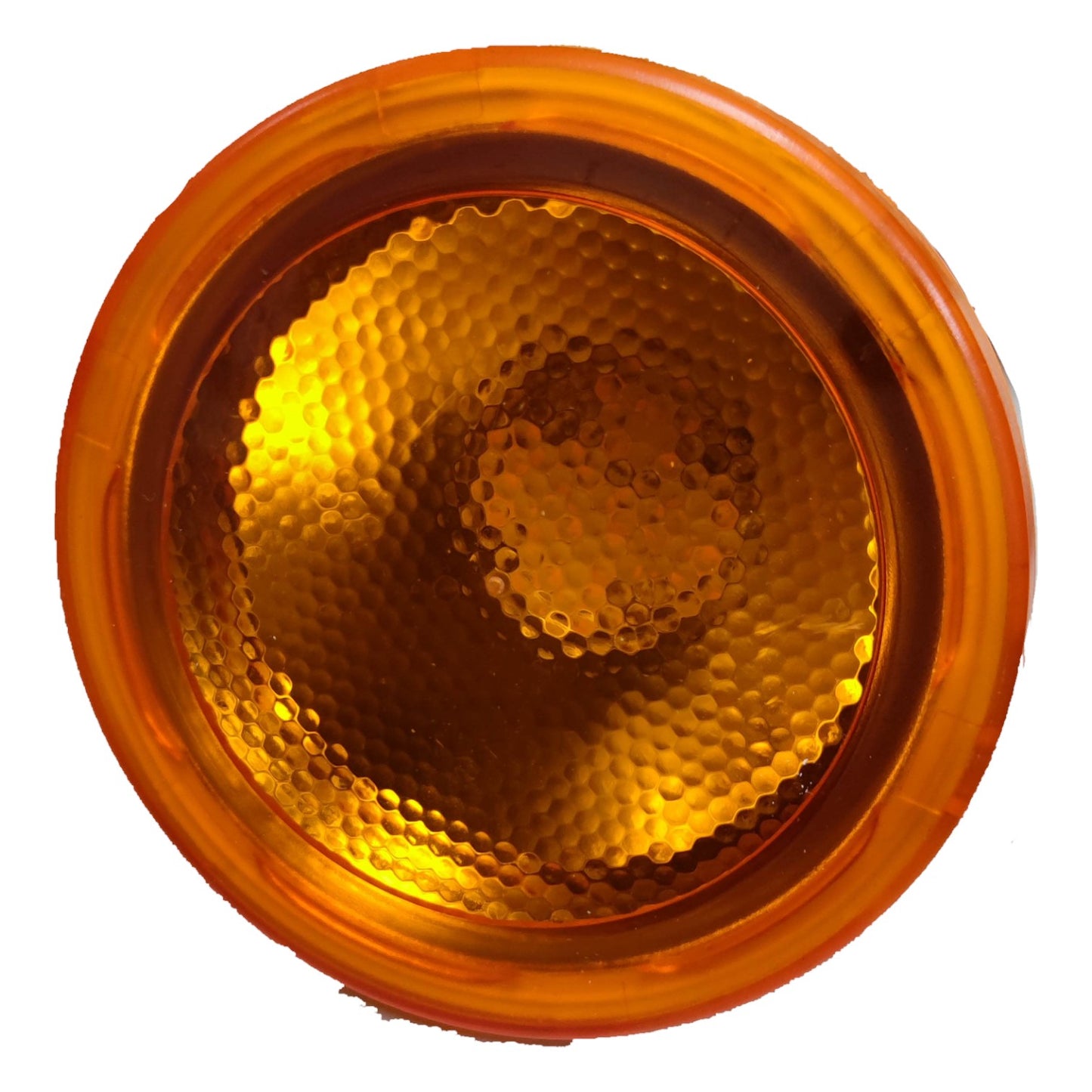 Round amber traffic light on a white background
