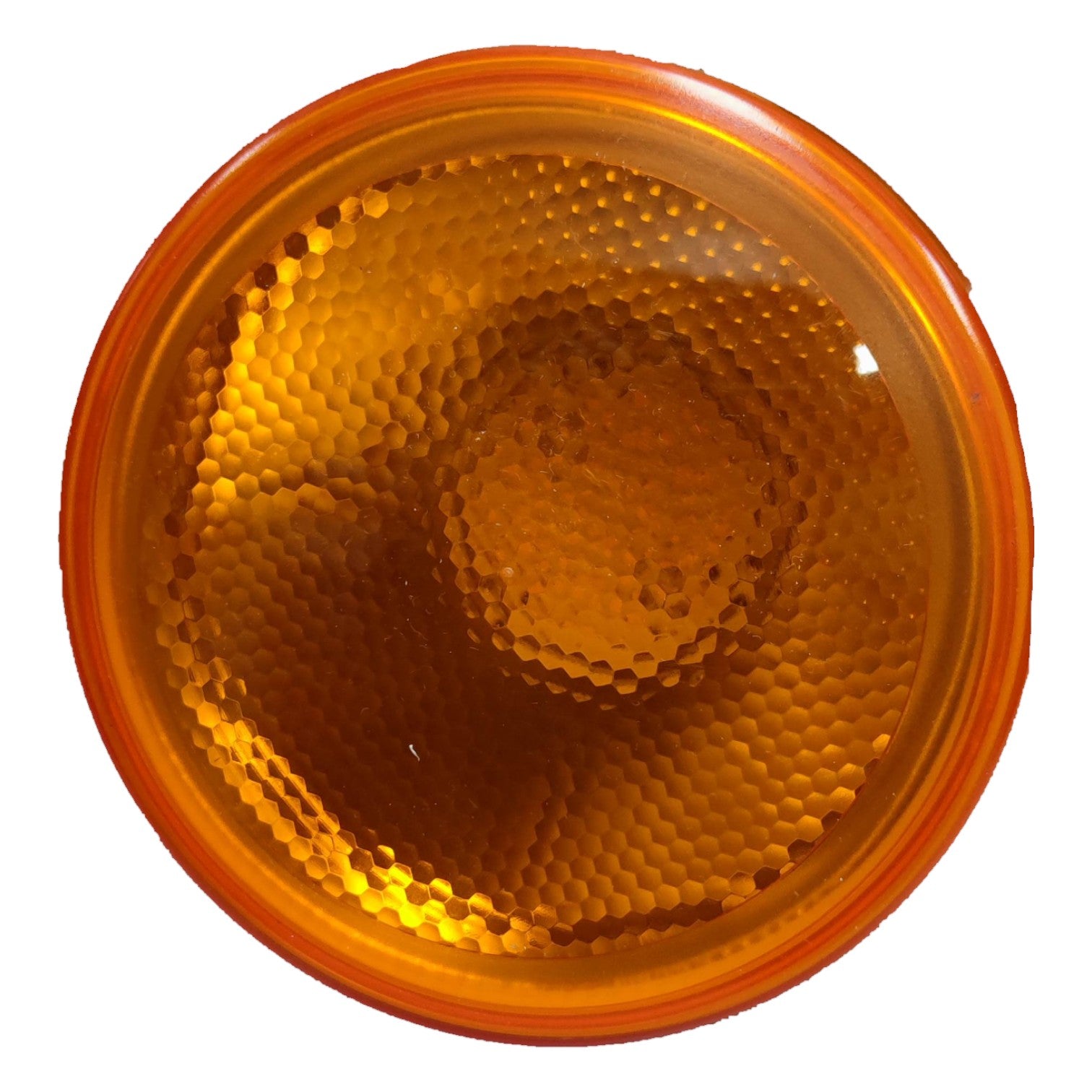 Round orange reflector with honeycomb pattern on a white background