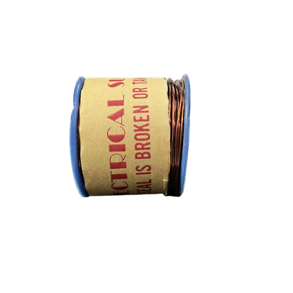 Spool of electrical wire with cardboard label on a white background