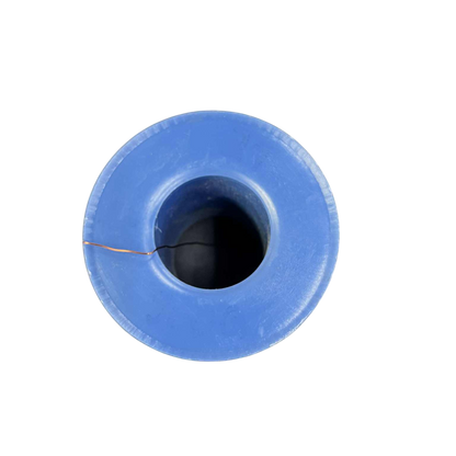 Blue spool of thread on a white background