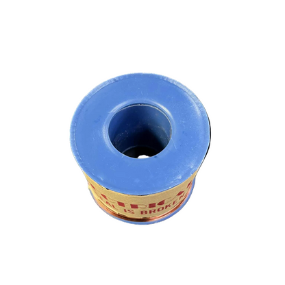 Blue spool of thread with a white background