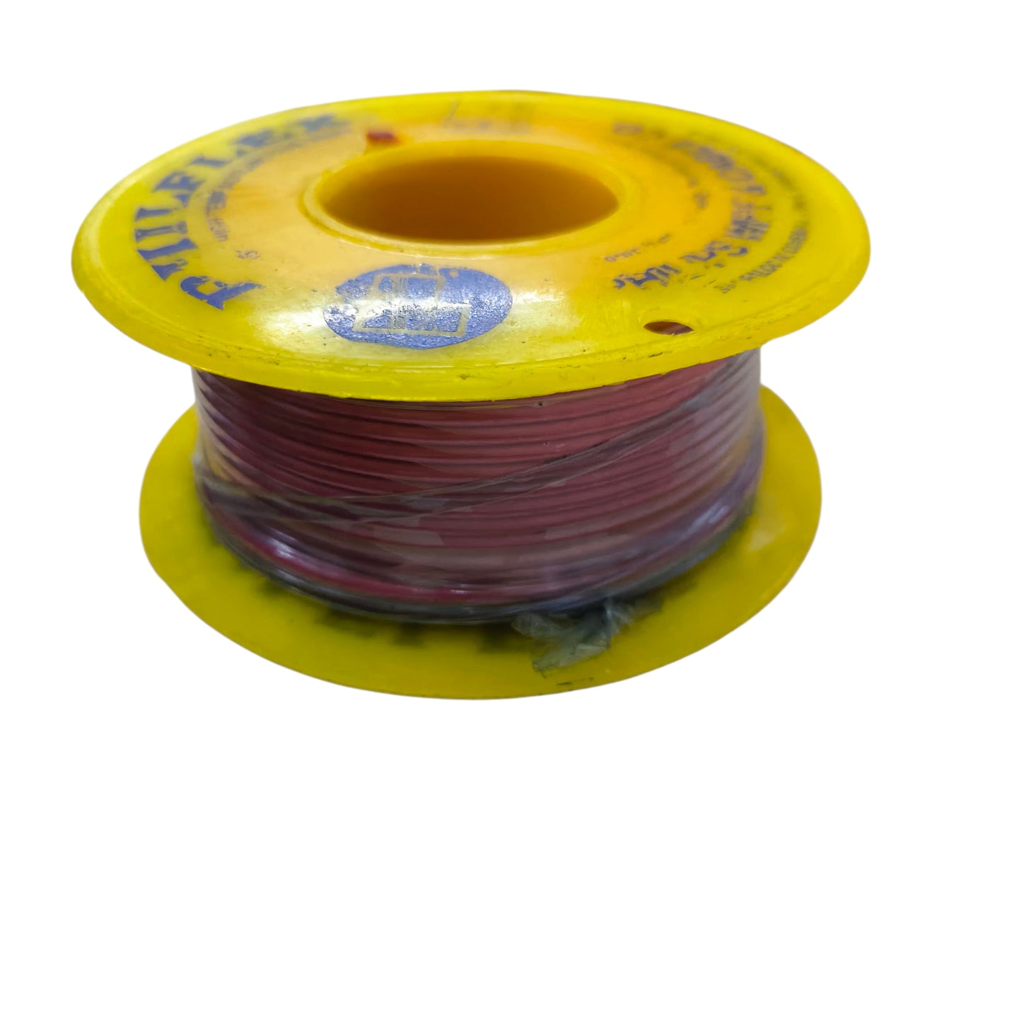 Spool of red wire with a yellow cap on a white background