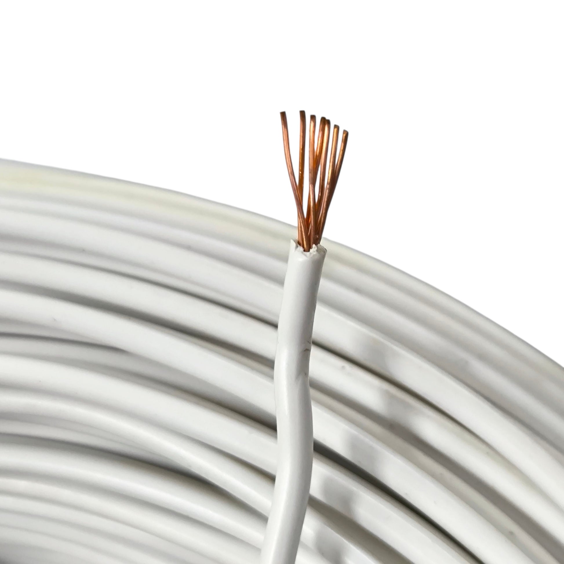 Coiled white cable with exposed copper wire on a white background
