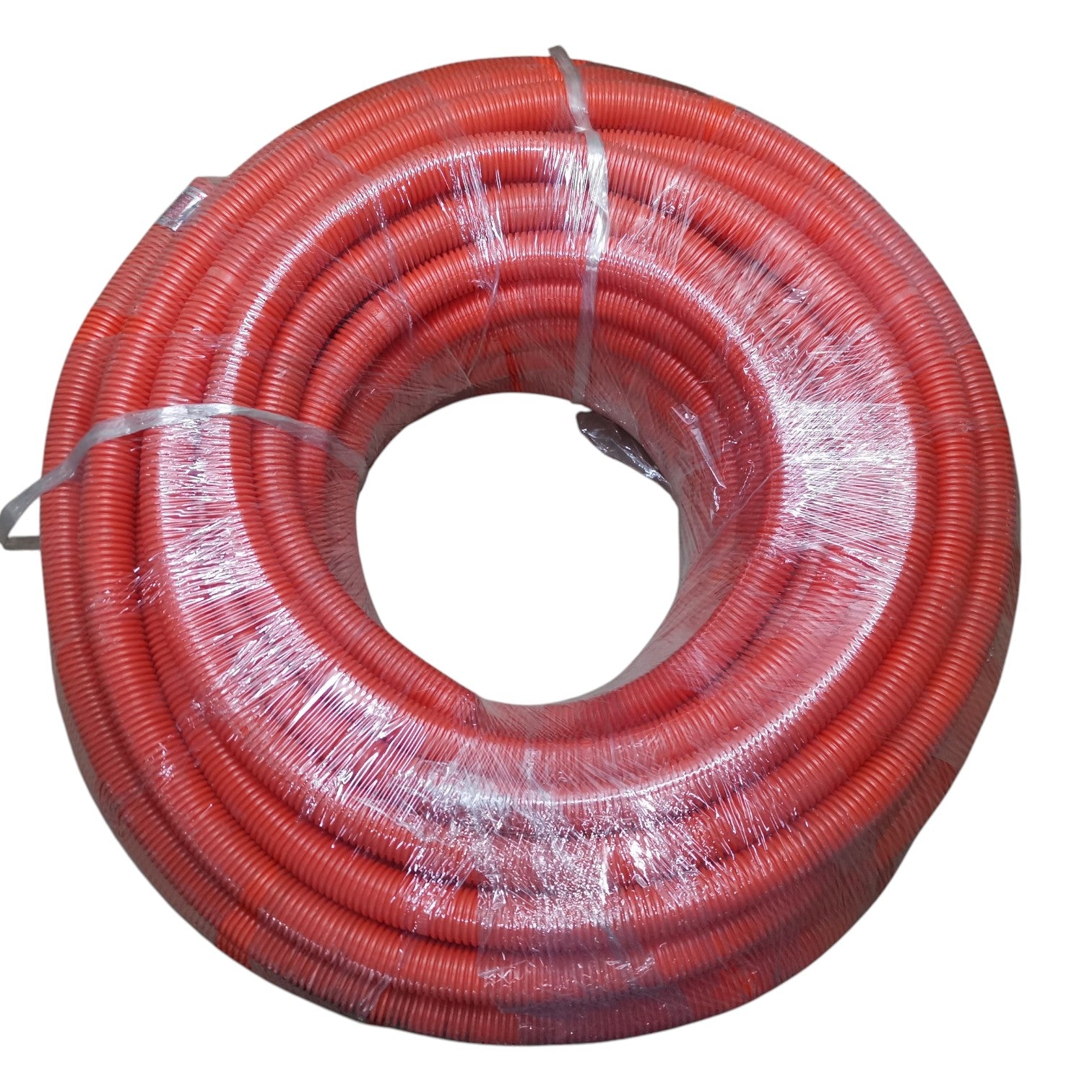 Coiled red hose on a white background