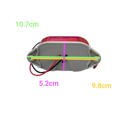 Denko work and safety light shown from the side with dimensions 10.7 cm height 9.8 cm length and 5.2 cm width