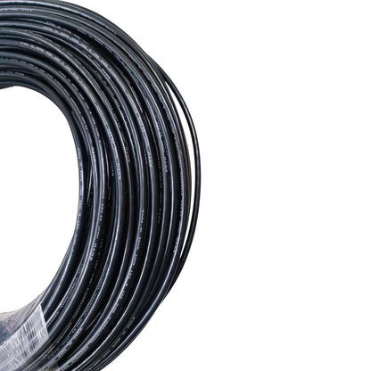 Coiled black cable on a white background