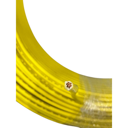 Close-up of yellow cable with a clear core on a white background