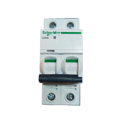 Schneider electrical circuit breaker on a white background