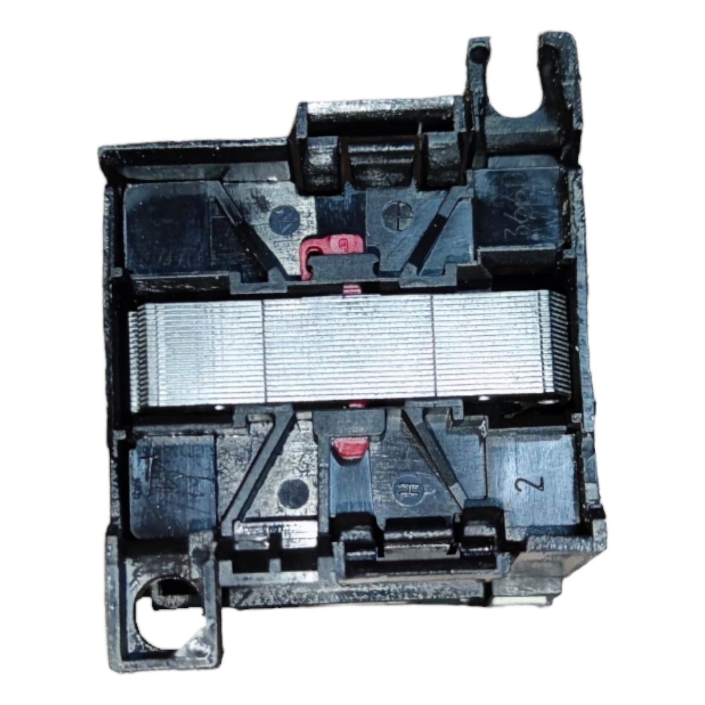 Close-up of a black plastic component with multiple parts on a white background