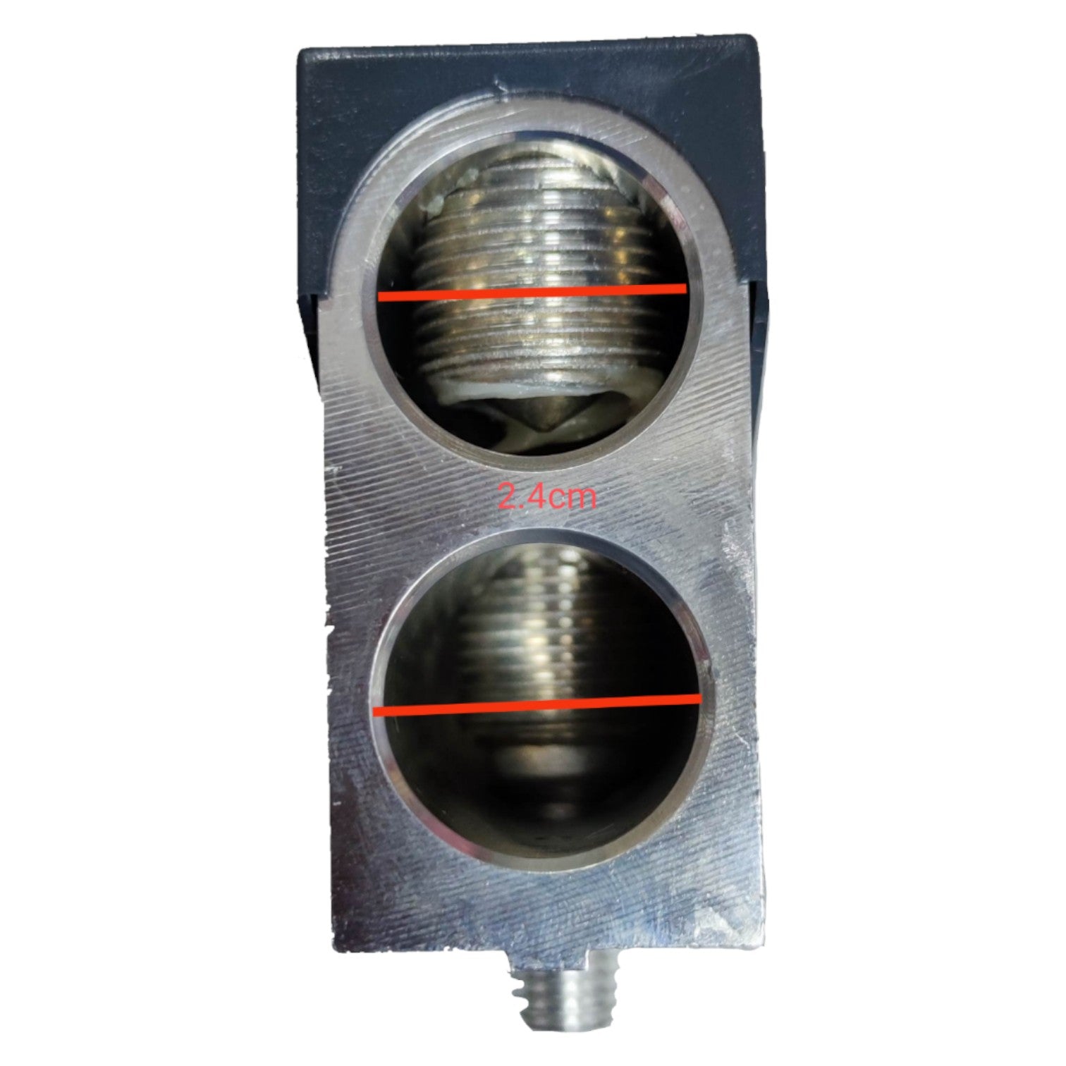 Metallic component with threaded holes on a white background