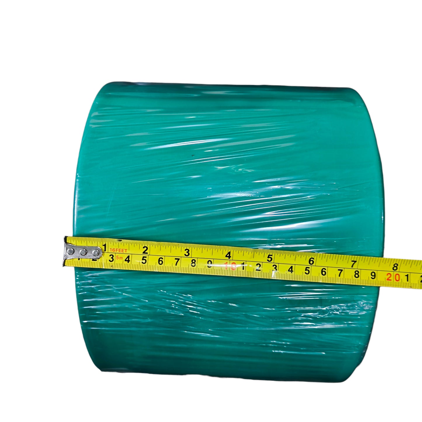 Roll of green plastic wrap with a yellow measuring tape on a white background
