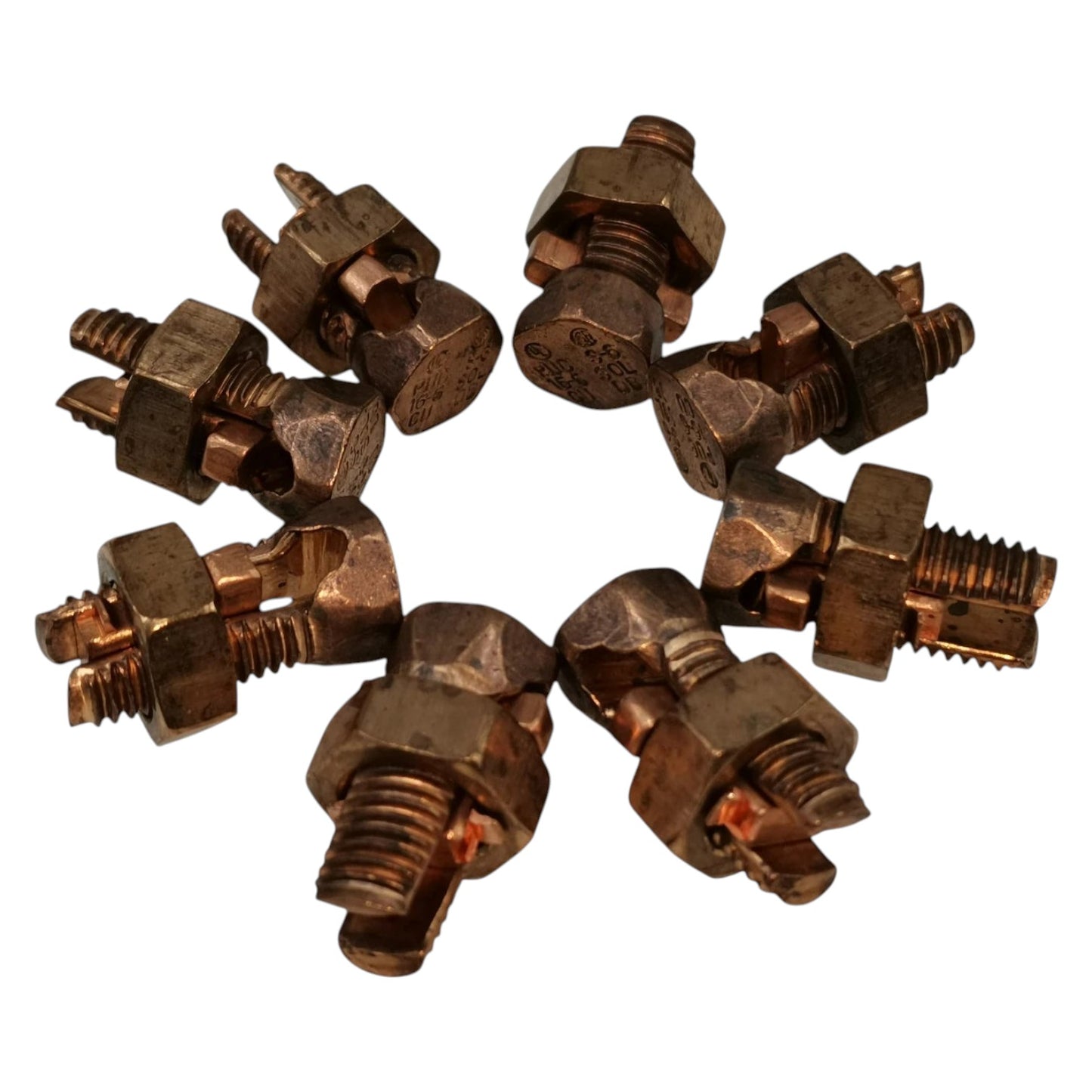 Collection of bronze nozzles on a white background