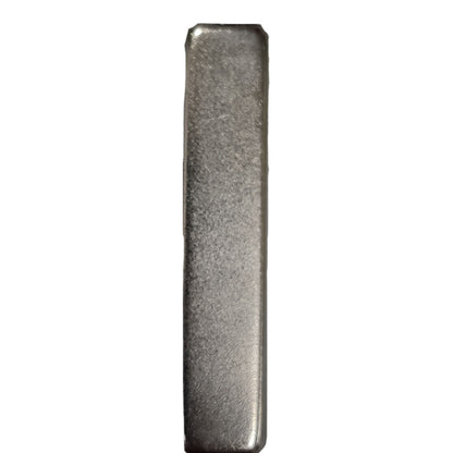 Rectangular metal block on a white background