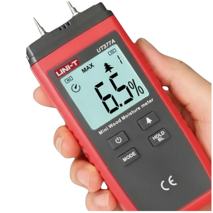 Red and black UNI-T wood moisture meter held in a hand with a white  UNI-T Mini Digital Wood Moisture Tester UT377A with LCD Display Applicable for 4 Types of Wood Batteries not Included 3pcs AAA Electx Electrical SUpplybackground