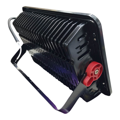 Black industrial fan with red component on a white background