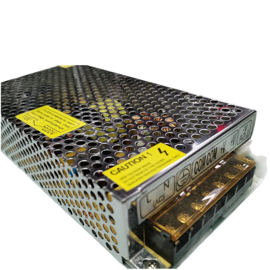 Power supply unit with metallic surface and yellow caution label on a white background