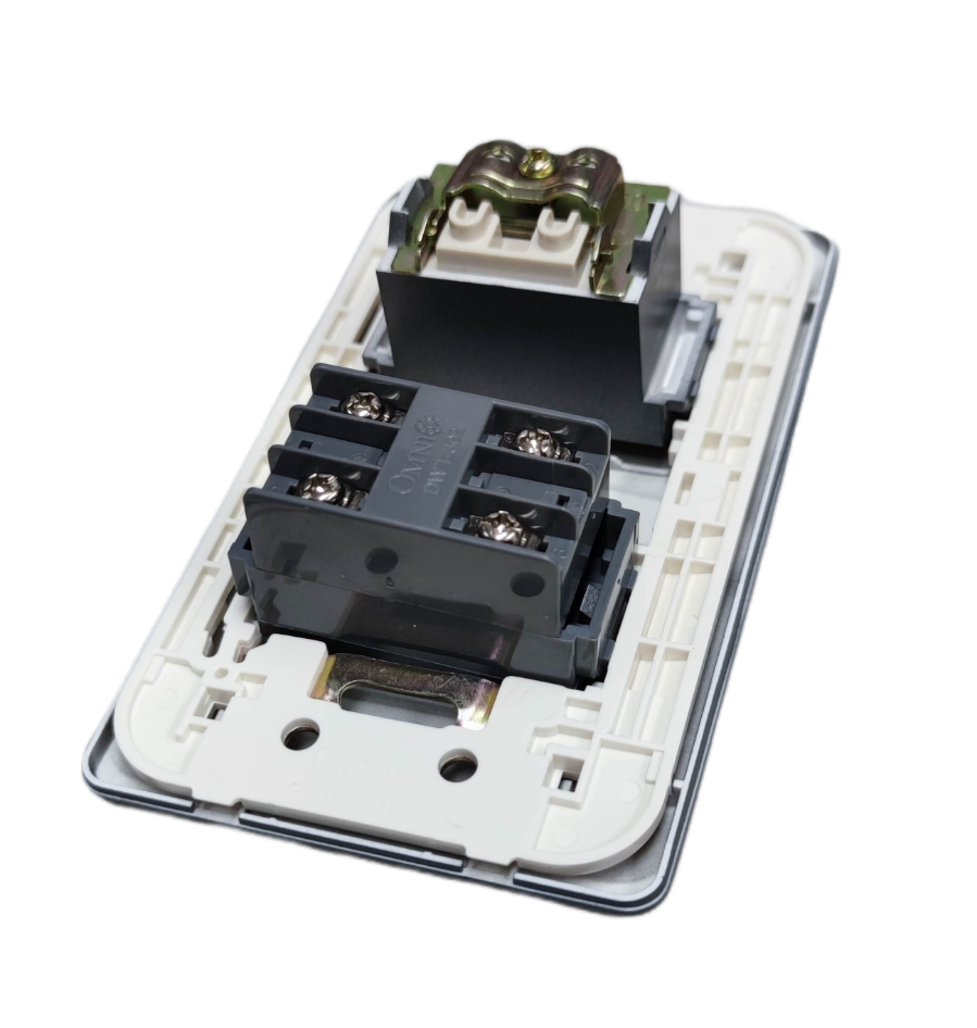 Omni wall switch assembly showing mounting bracket wiring terminals and graphite finish electrical outlet plate