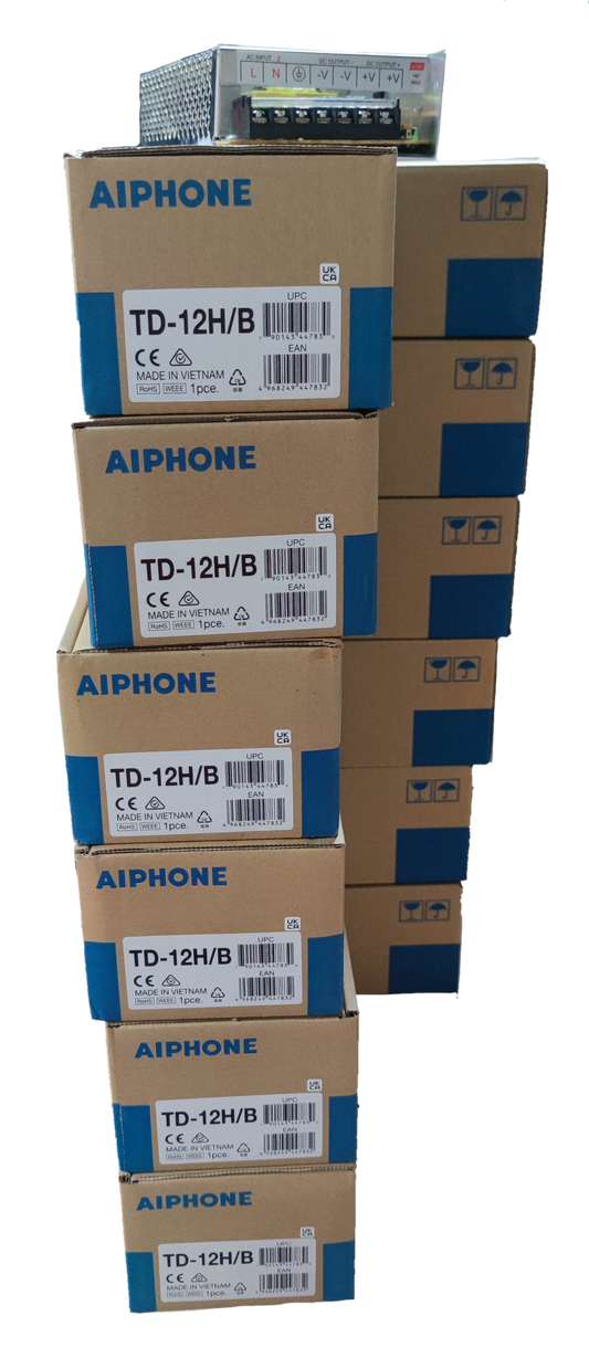 Stack of Aiphone 12 station intercom system boxes with one unit displayed on top