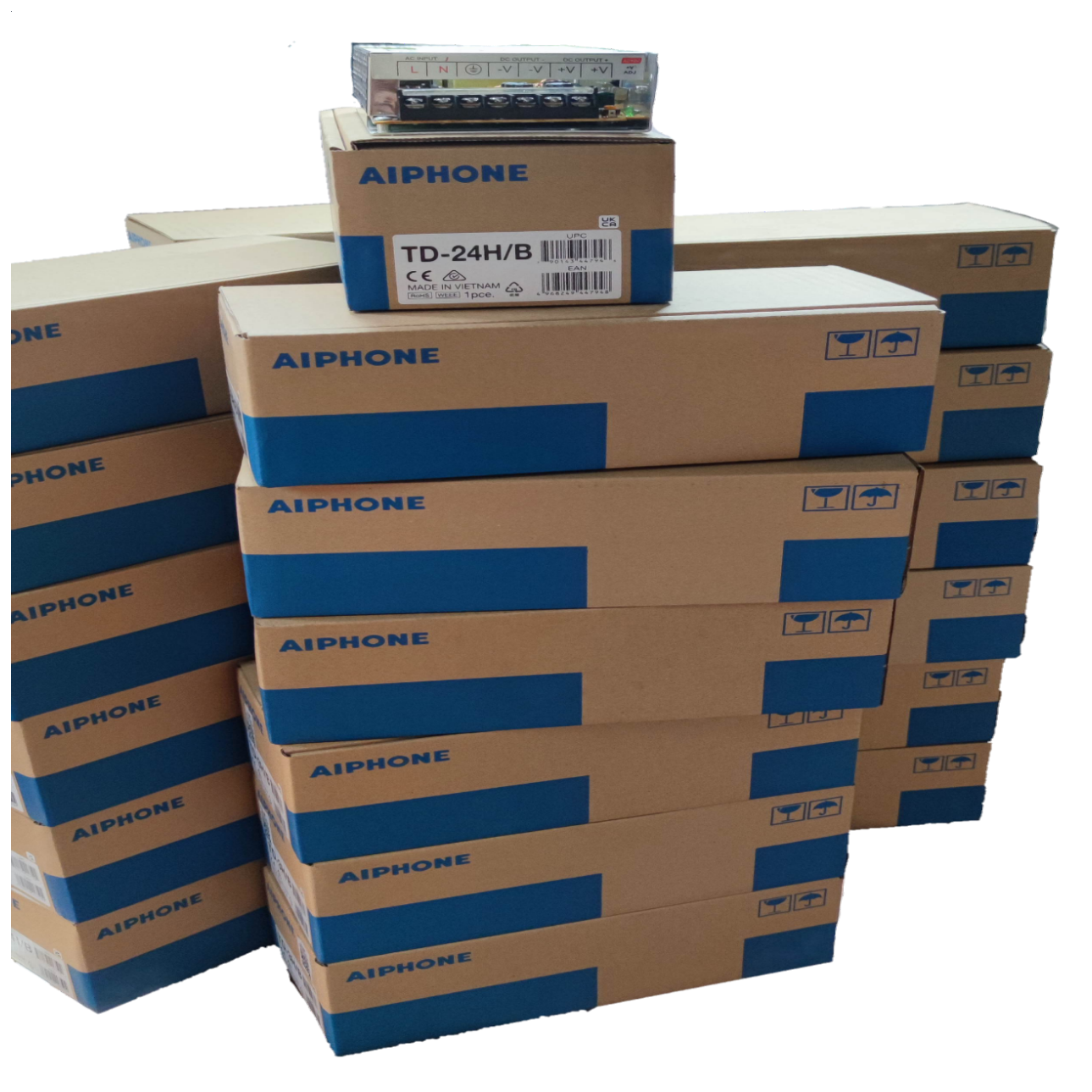 Stack of Aiphone boxes containing Aiphone 24 Sub station intercom system for security and communication