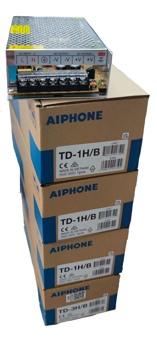 Aiphone 3 station intercom system power supply units stacked in packaging boxes for CCTV and security