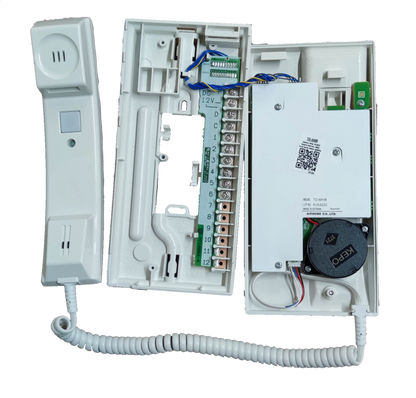 Open Aiphone 6 station intercom showing internal wiring and handset for security system