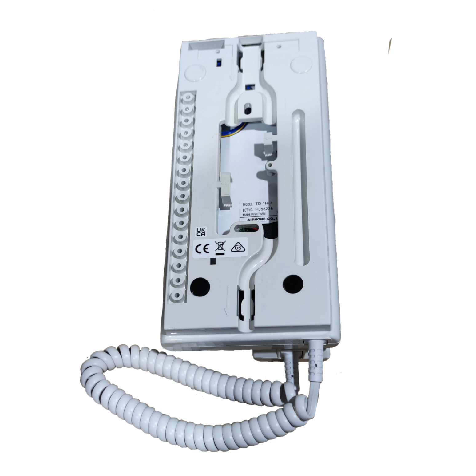 Back view of Aiphone intercom substation TD-1H with coiled handset cord and wiring terminals for security systems