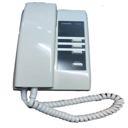 White Aiphone intercom system with handset and call buttons for secure communication